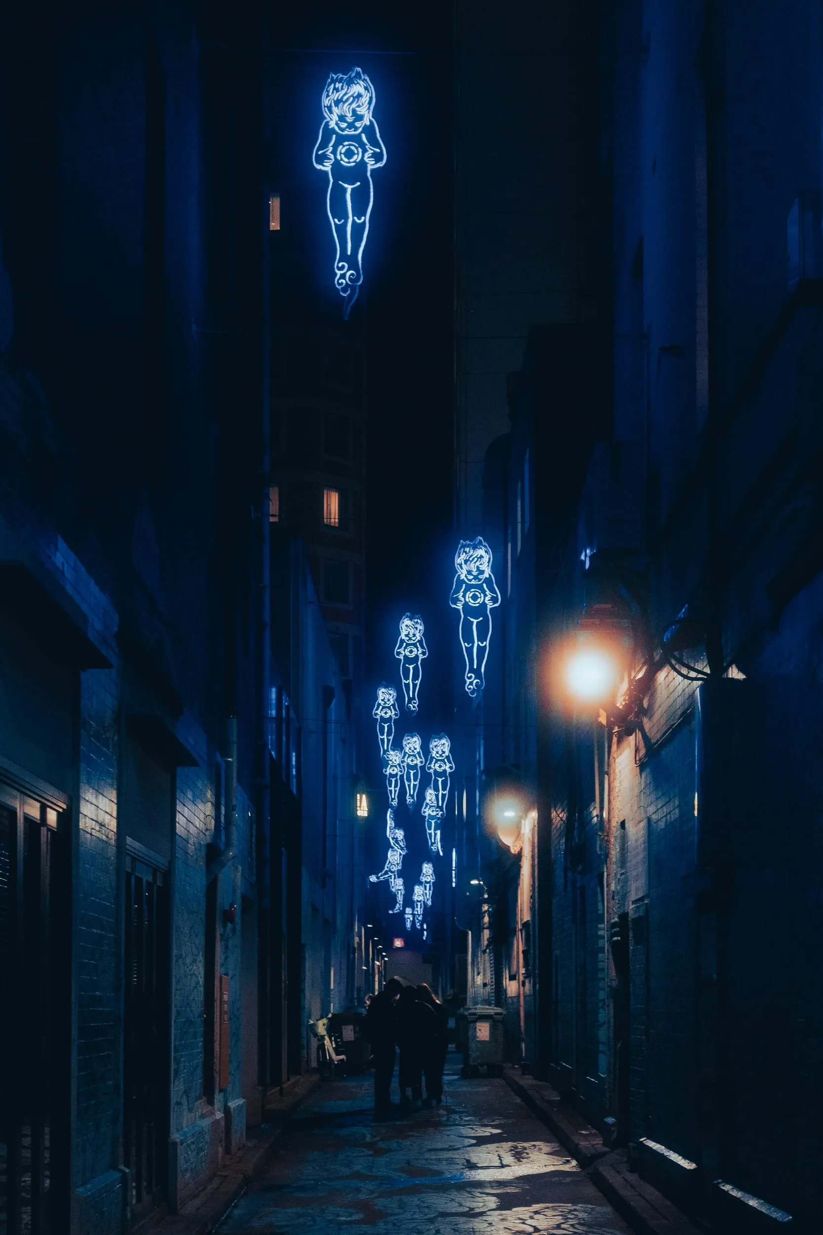 A lit Sydney laneway at night