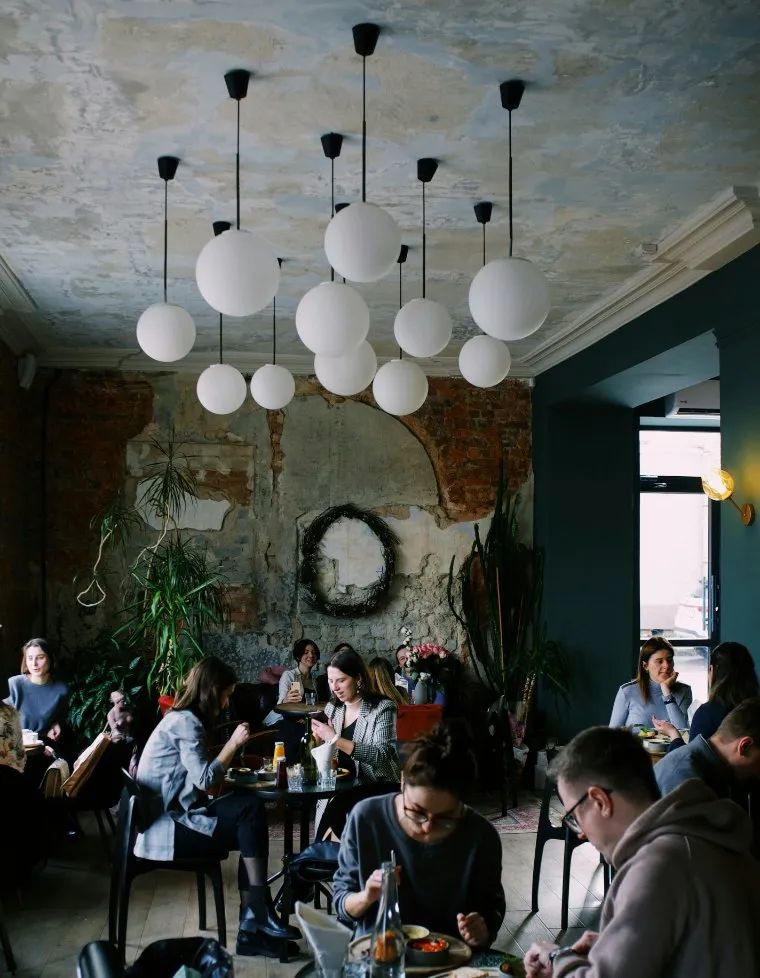 A busy cafe, people in conversation
